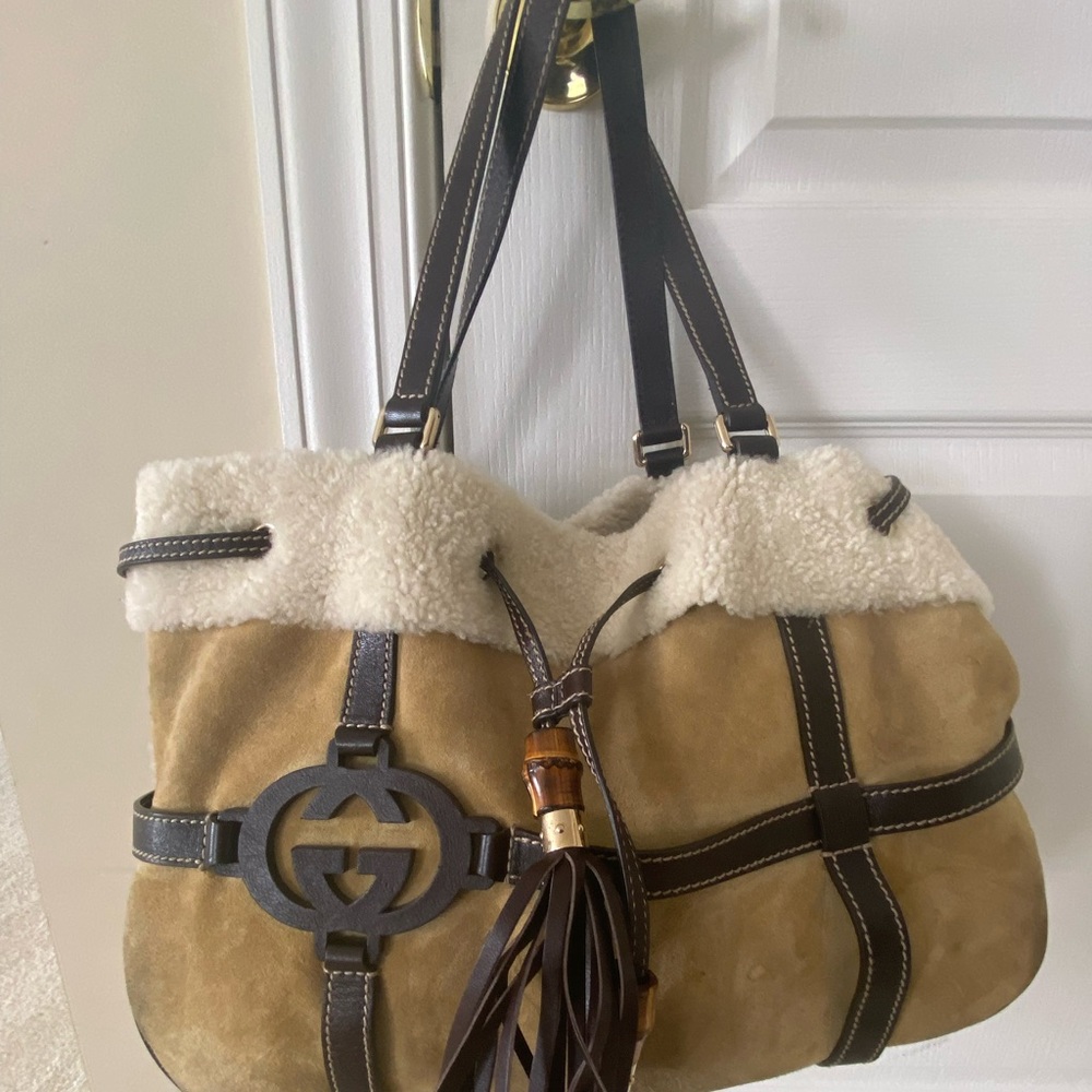 Brown and tan Gucci logo bag